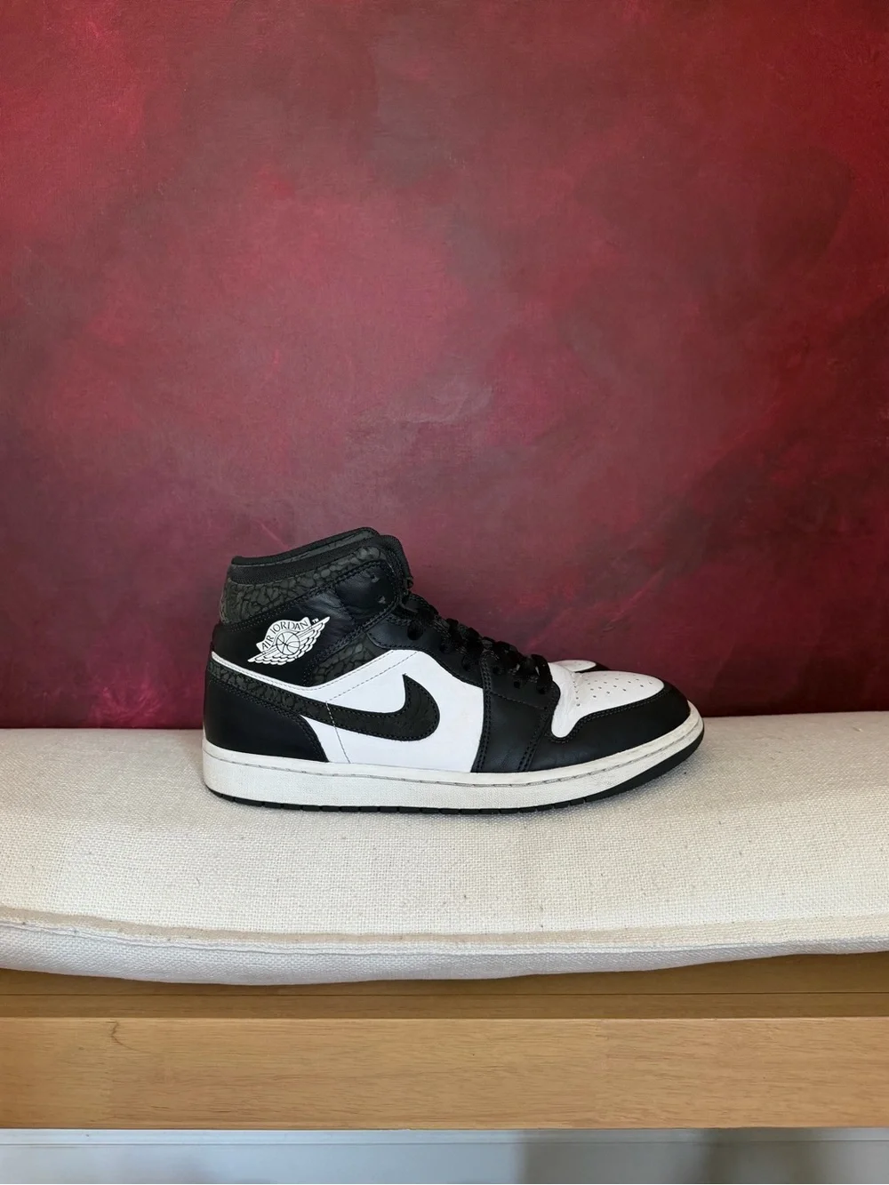 Jordan Black and White Mid-Top Sneaker